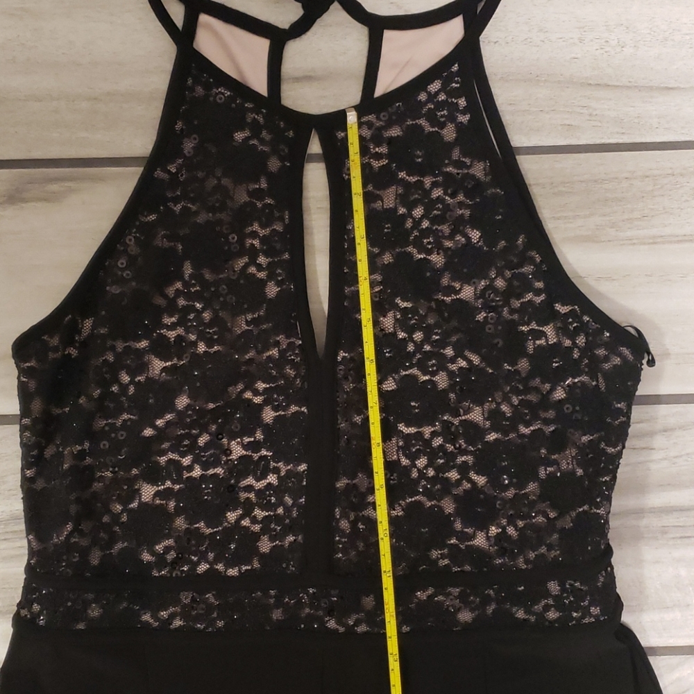 Jumpsuit by: R & M Collection. - Picture 8 of 15